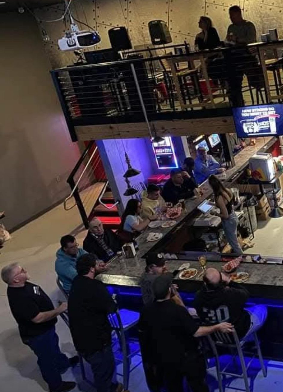 The bar and upstairs loft at 6ers